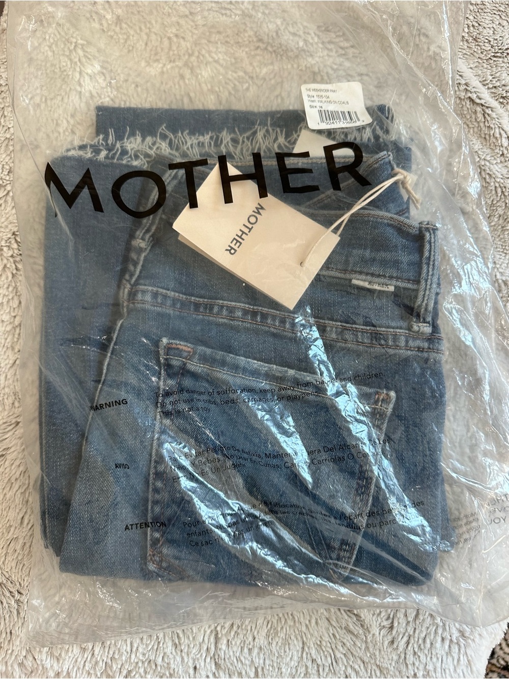MOTHER Denim Jeans in Medium Blue